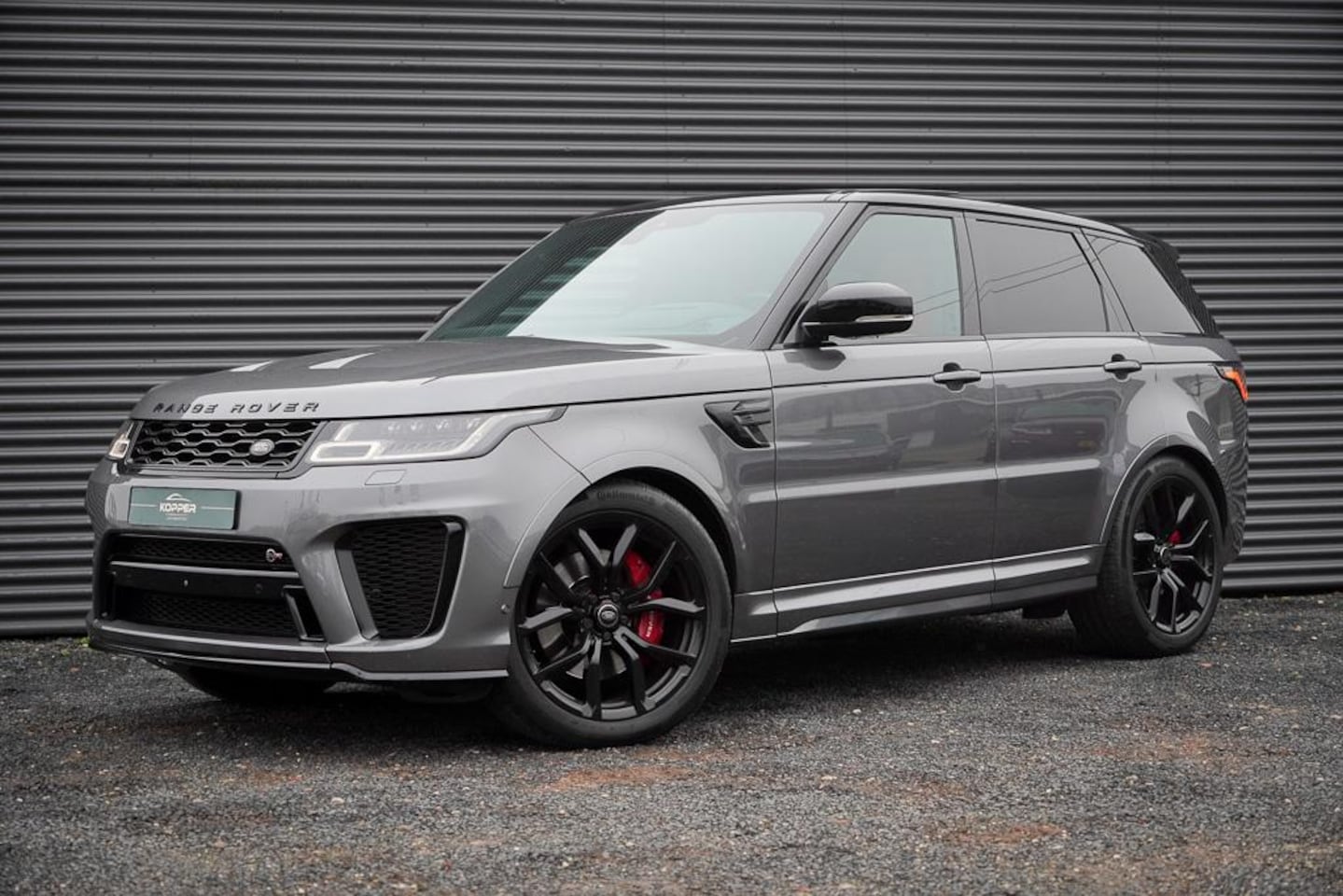 Land Rover Range Rover Sport - 5.0 V8 SC SVR / Pano / Kuipstoelen / Corris Grey - AutoWereld.nl