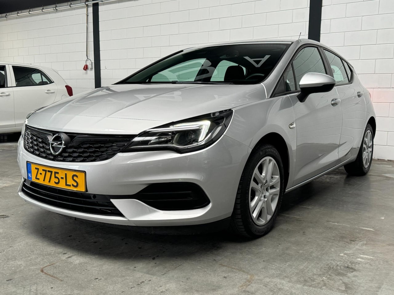 Opel Astra - 1.2 Edition AIRCO | CRUISE | NAVI | PDC | APK - AutoWereld.nl