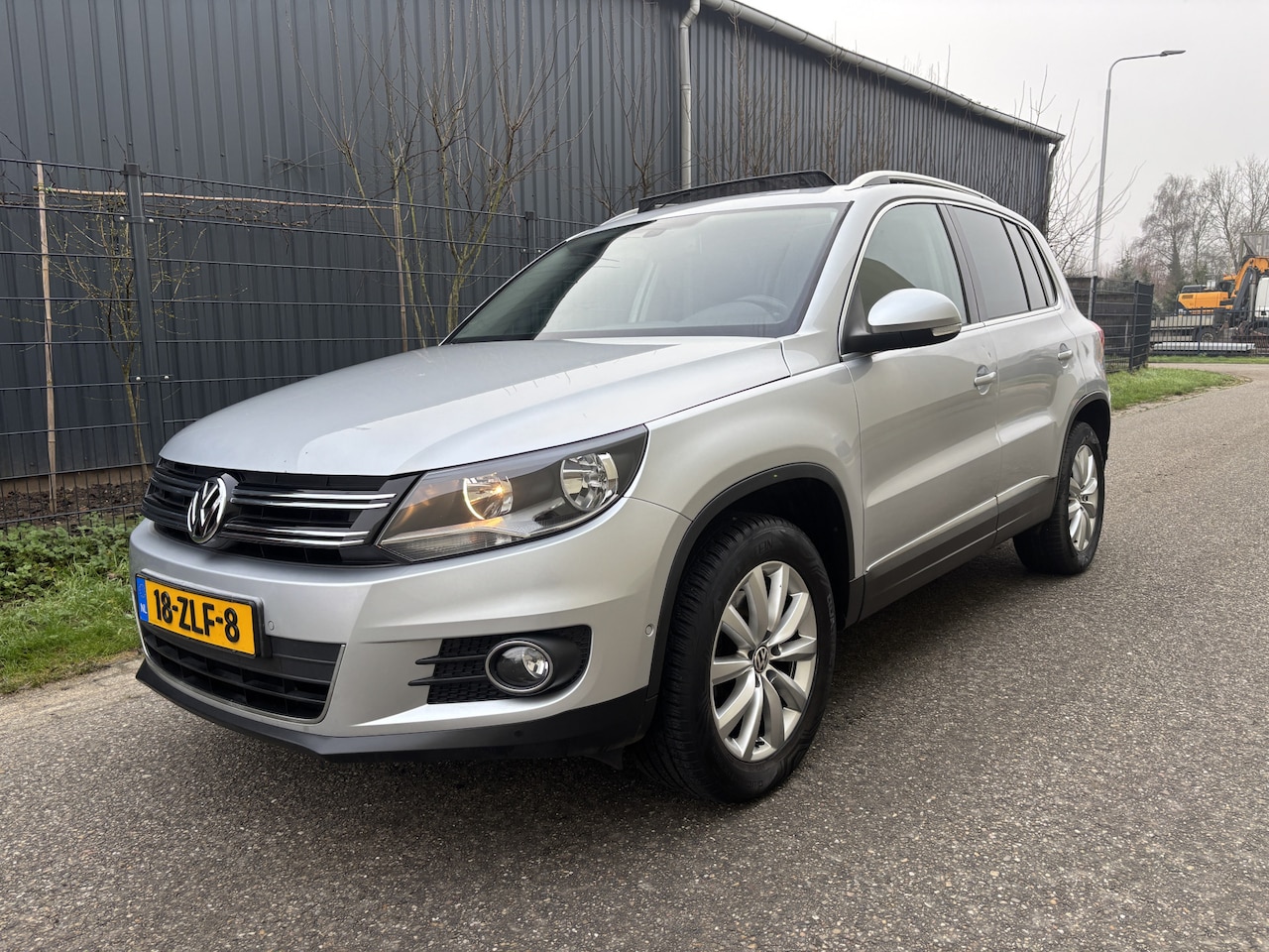 Volkswagen Tiguan - 1.4 TSI Sport&Style / NAVI / CRUISE / PANORAMADAK / AIRCO - AutoWereld.nl