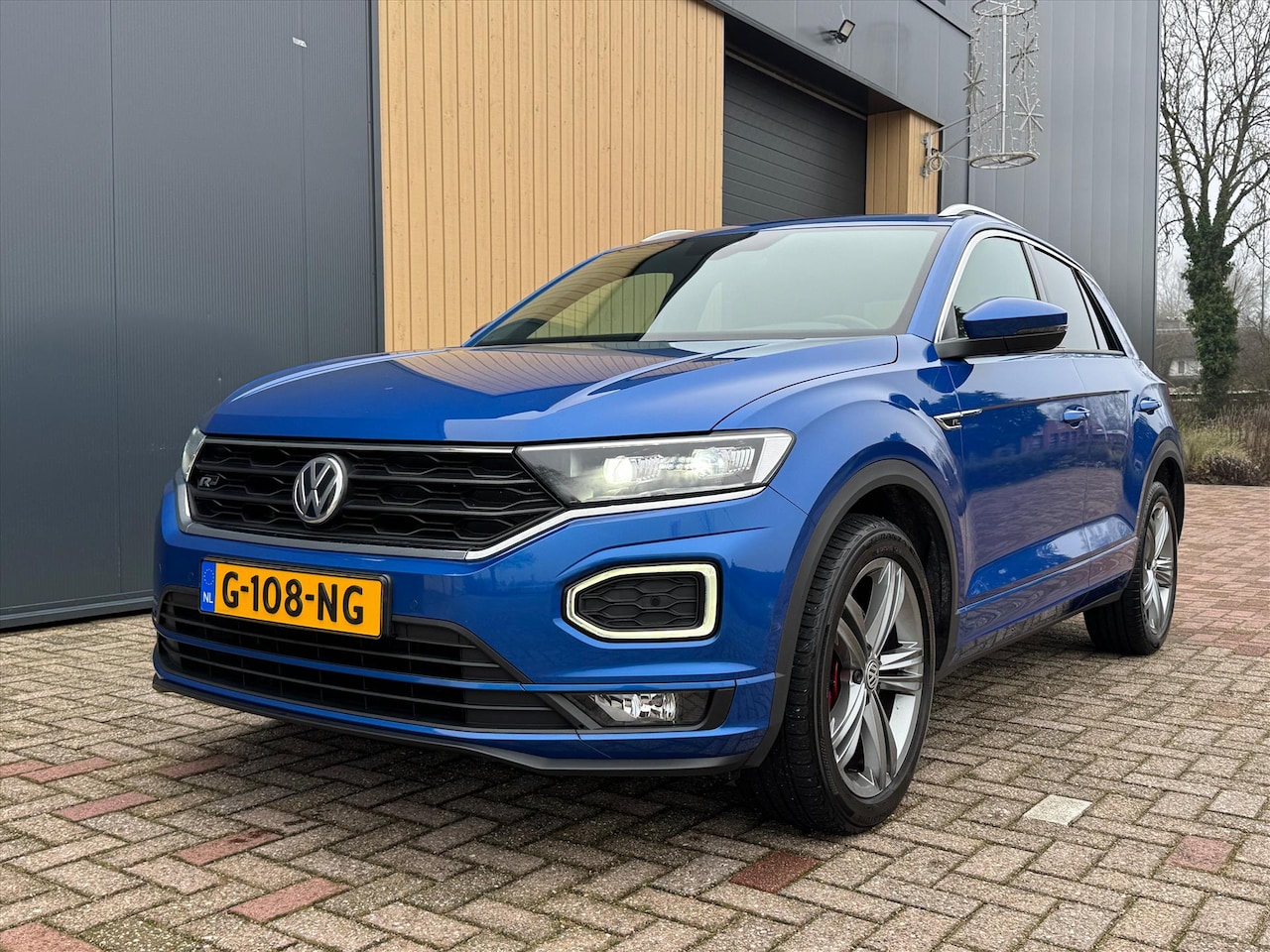 Volkswagen T-Roc - 1.5 TSI 150pk T-Roc R-Line | NL Auto | Trekhaak | Elektrische Achterklep | Carplay | - AutoWereld.nl