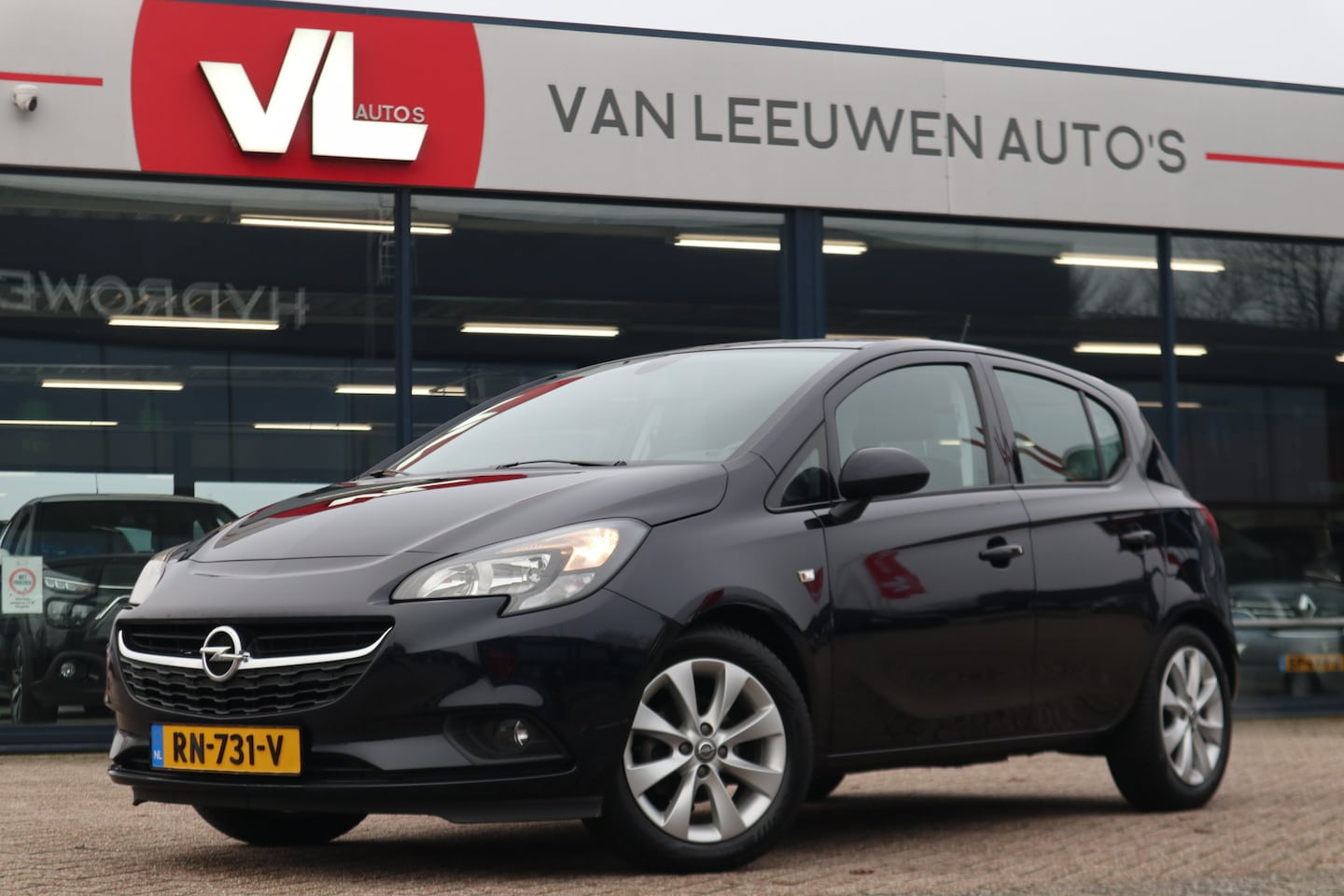 Opel Corsa - 1.4 Favourite | Airco | Navi | Cruise - AutoWereld.nl