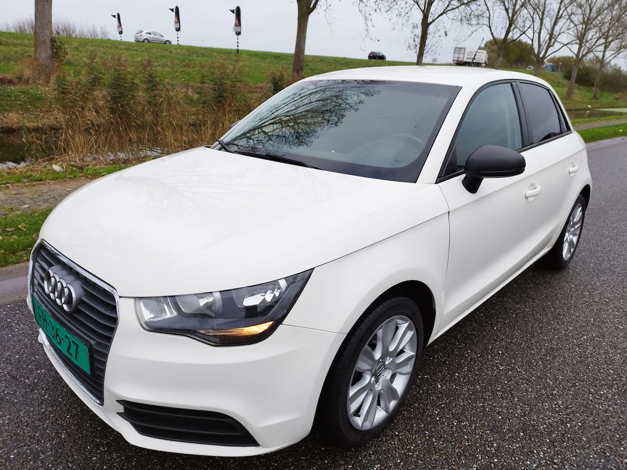 Audi A1 Sportback - 1.2 TFSI ** 5 DRS ** 135.875 KM ** NAVI ** MMI ** Airco ** winterpakket - AutoWereld.nl