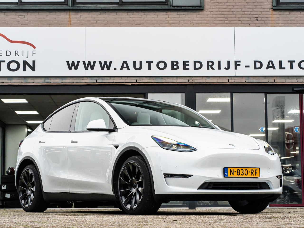 Tesla Model Y - Long Range AWD 75 kWh WIT LEER / AUTOPILOT / PANODAK / INCL. BTW - AutoWereld.nl