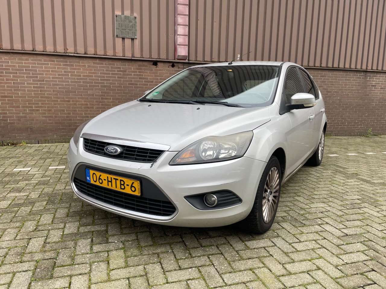 Ford Focus - 1.6 Titanium Navi Trekhaak PDC Clima APK NAP - AutoWereld.nl