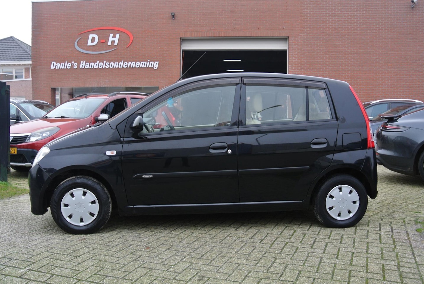 Daihatsu Cuore - 1.0-12V Tokyo apk 24-10-2025 inruil mogelijk nap - AutoWereld.nl