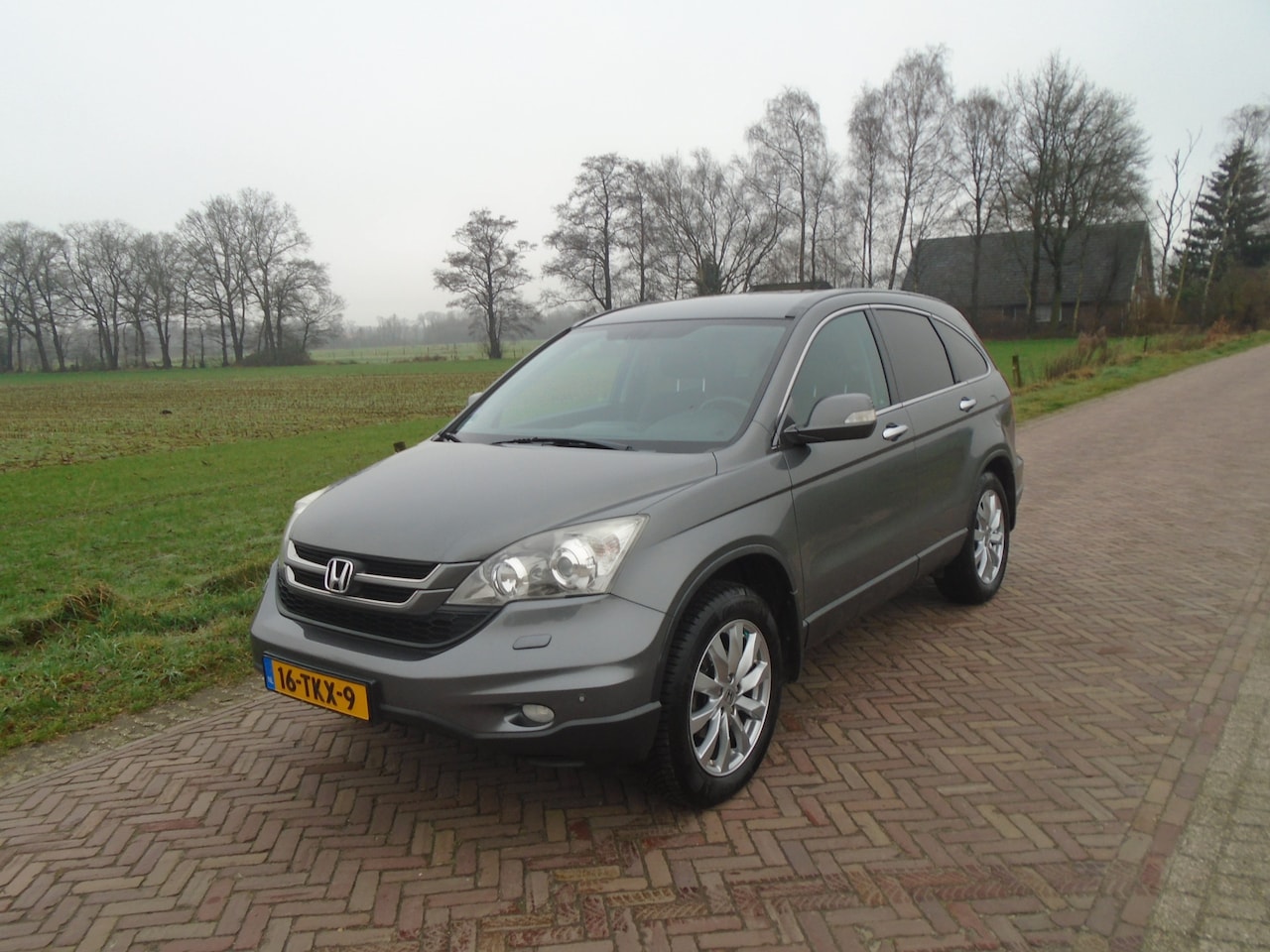 Honda CR-V - 2.0i Executive NAVI XENON CAMERA TRHAAK - AutoWereld.nl