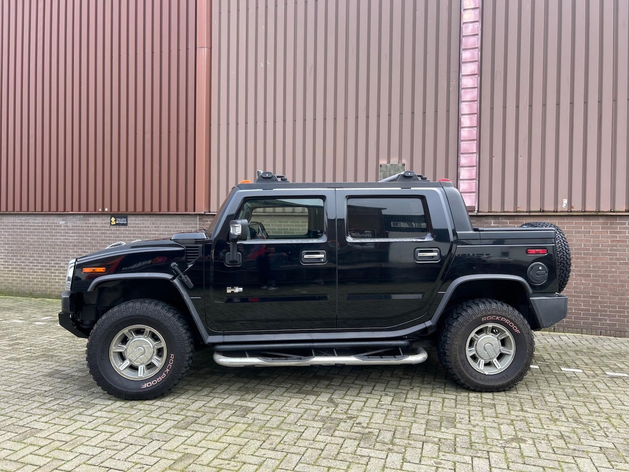 Hummer H2 - 6.0 V8 SUT Exclusive Pano Navi Leer Automaat NAP - AutoWereld.nl