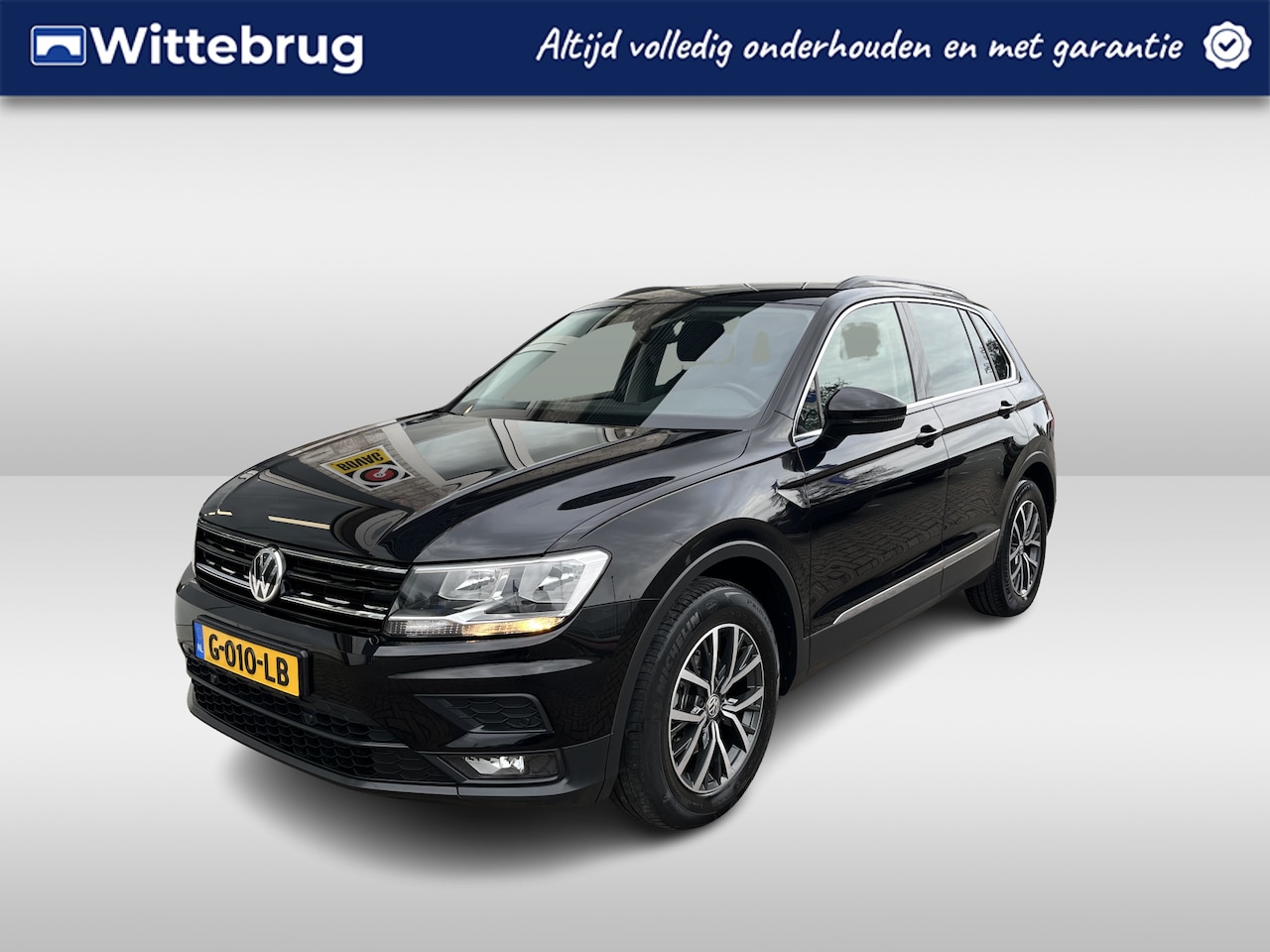 Volkswagen Tiguan - 1.5 TSI ACT Comfortline / AUTOMAAT/ TREKHAAK/ PARK. SENSOREN/ ADAPT. CRUISE/ APP CONNECT/ - AutoWereld.nl