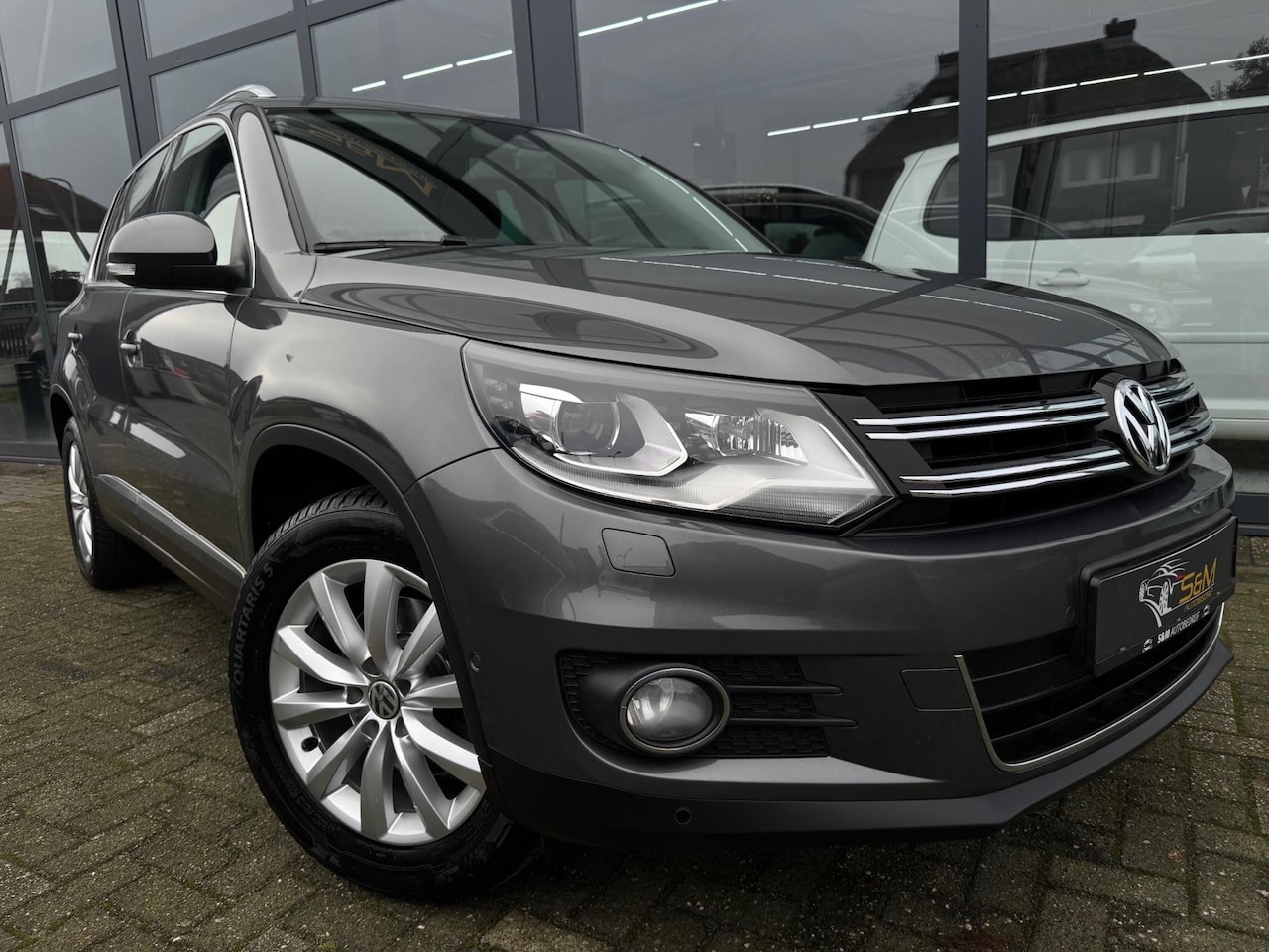 Volkswagen Tiguan - 1.4 TSI Sport&Style - AutoWereld.nl