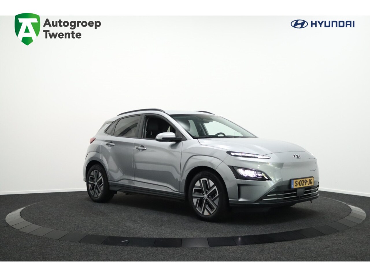 Hyundai Kona Electric - EV Premium 64 kWh | Leder | Navigatie | Apple carplay | Camera - AutoWereld.nl