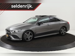 Mercedes-Benz CLA-Klasse - 180 AMG | Panoramadak | Stoelverwarming | Camera | Sfeerverlichting | Half leder | Navigat