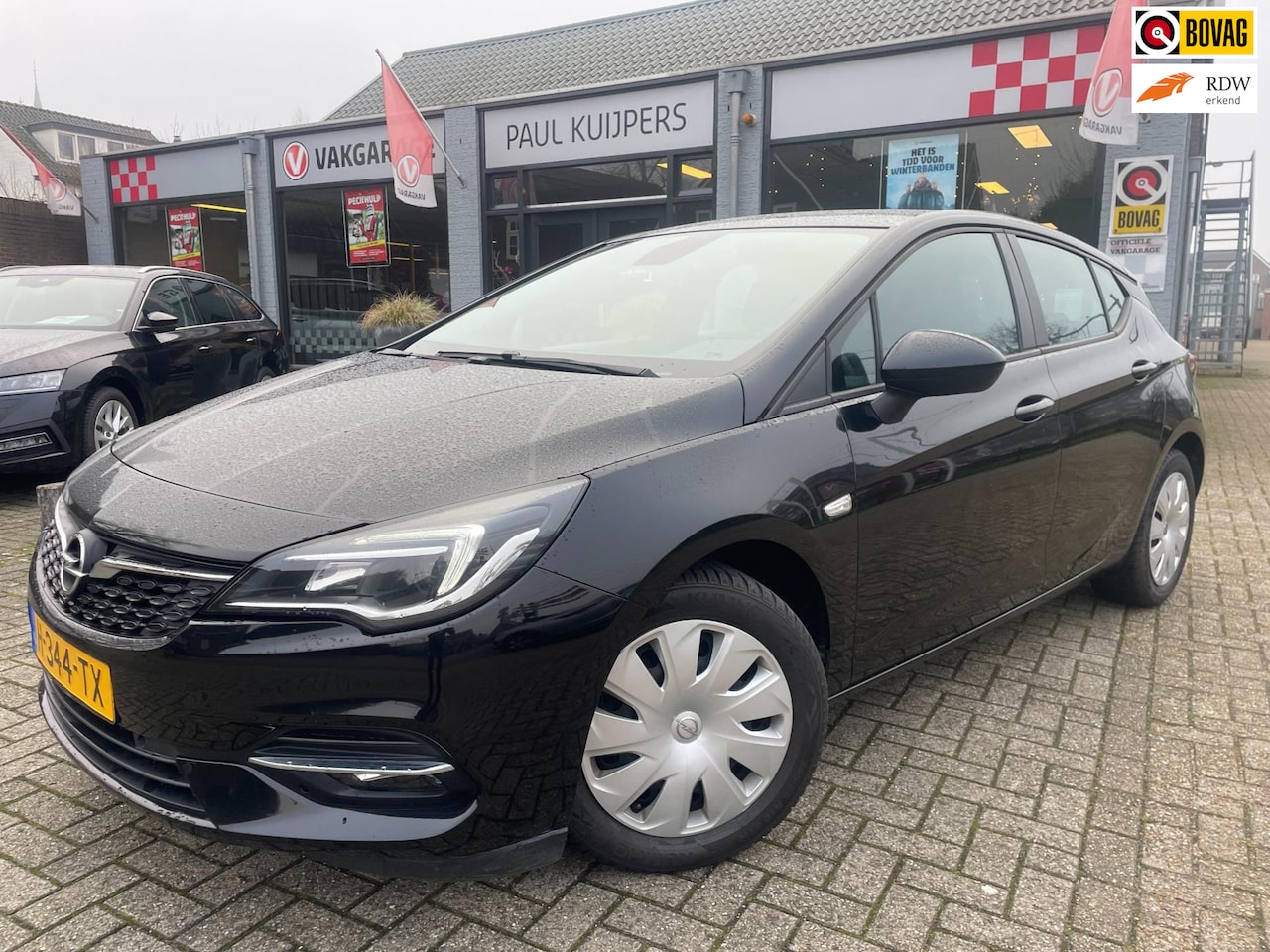 Opel Astra - 1.2 110pk Business Edition *navi + pdc + 1e eigenaar* - AutoWereld.nl