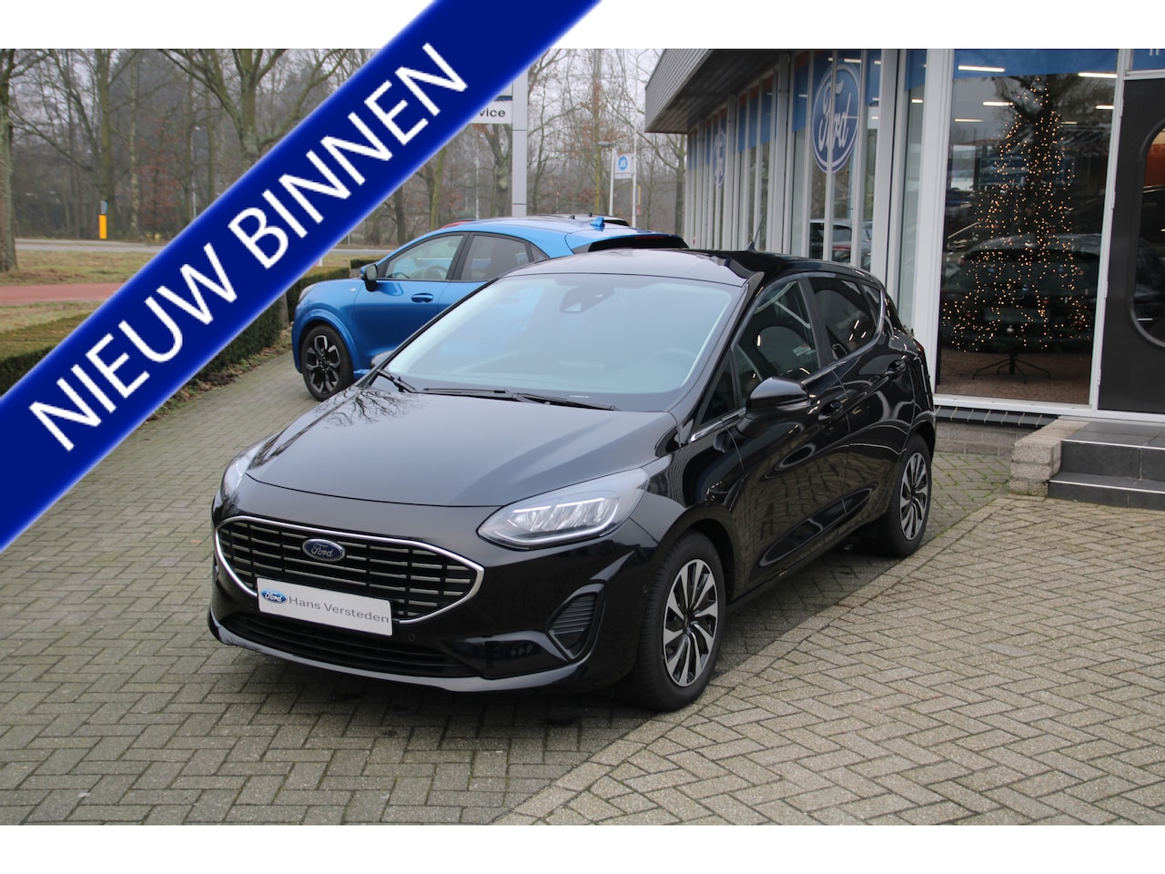 Ford Fiesta - 1.0 EcoBoost 125 PK Hybrid Titanium Automaat WINTERPACK | NAVIGATIE | DAB | CAMERA \ - AutoWereld.nl