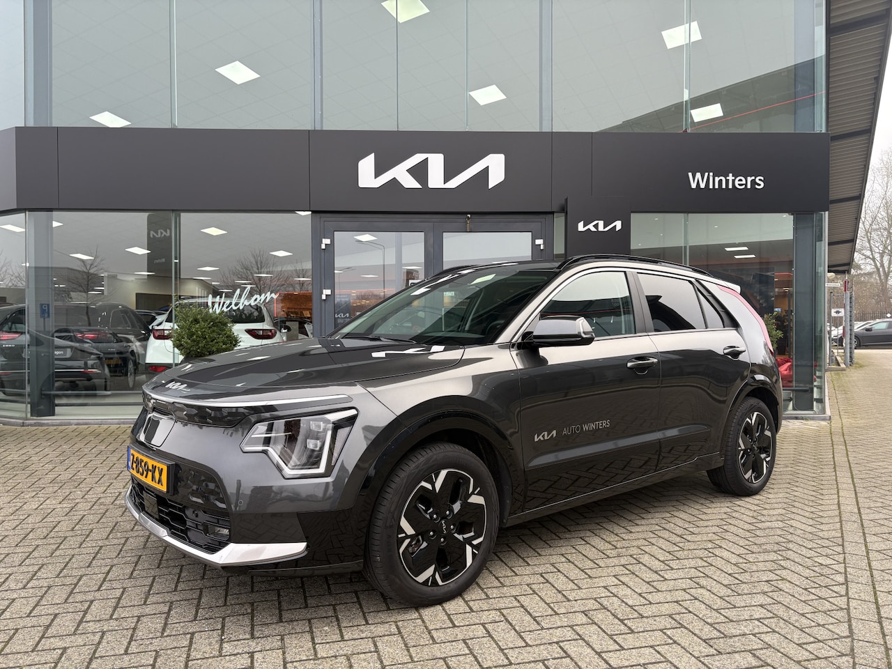 Kia Niro EV - Edition Advanced 64.8 kWh ECC Cr.Control-Adapt. Navi+Camera Leder+Verw. 17"LMV 7jr.Garanti - AutoWereld.nl