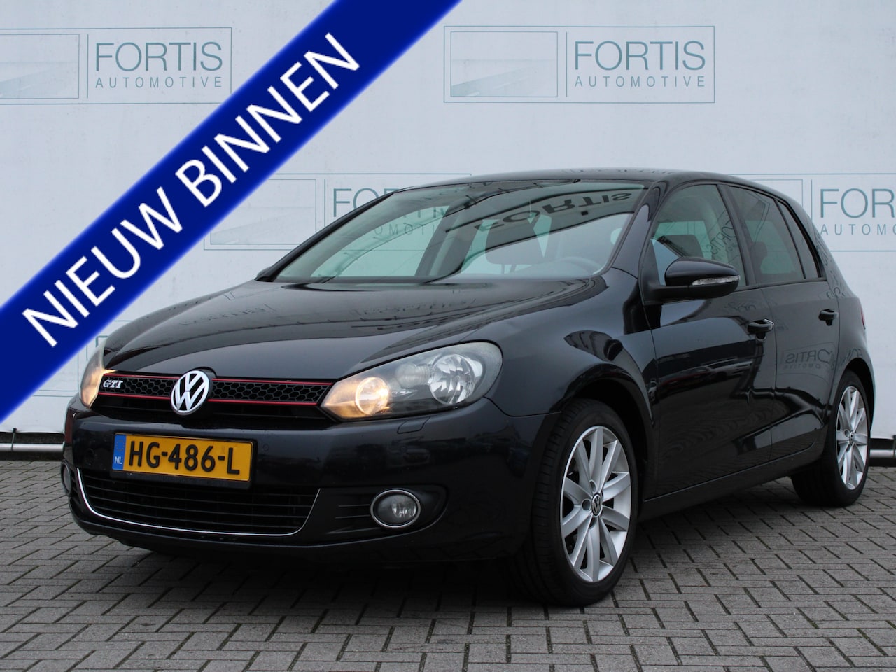 Volkswagen Golf - 1.4 TSI Highline GTI LOOK | STOELVERWARMING | CARPLAY - AutoWereld.nl