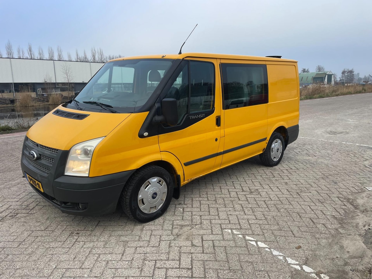 Ford Transit - 260S 2.2 TDCI DC!EURO5!AIRCO!ELECKTRISH RAAM&SPIEGEL!NAVIGATIE!6VERSNELLING!92KW&125PK!1JA - AutoWereld.nl