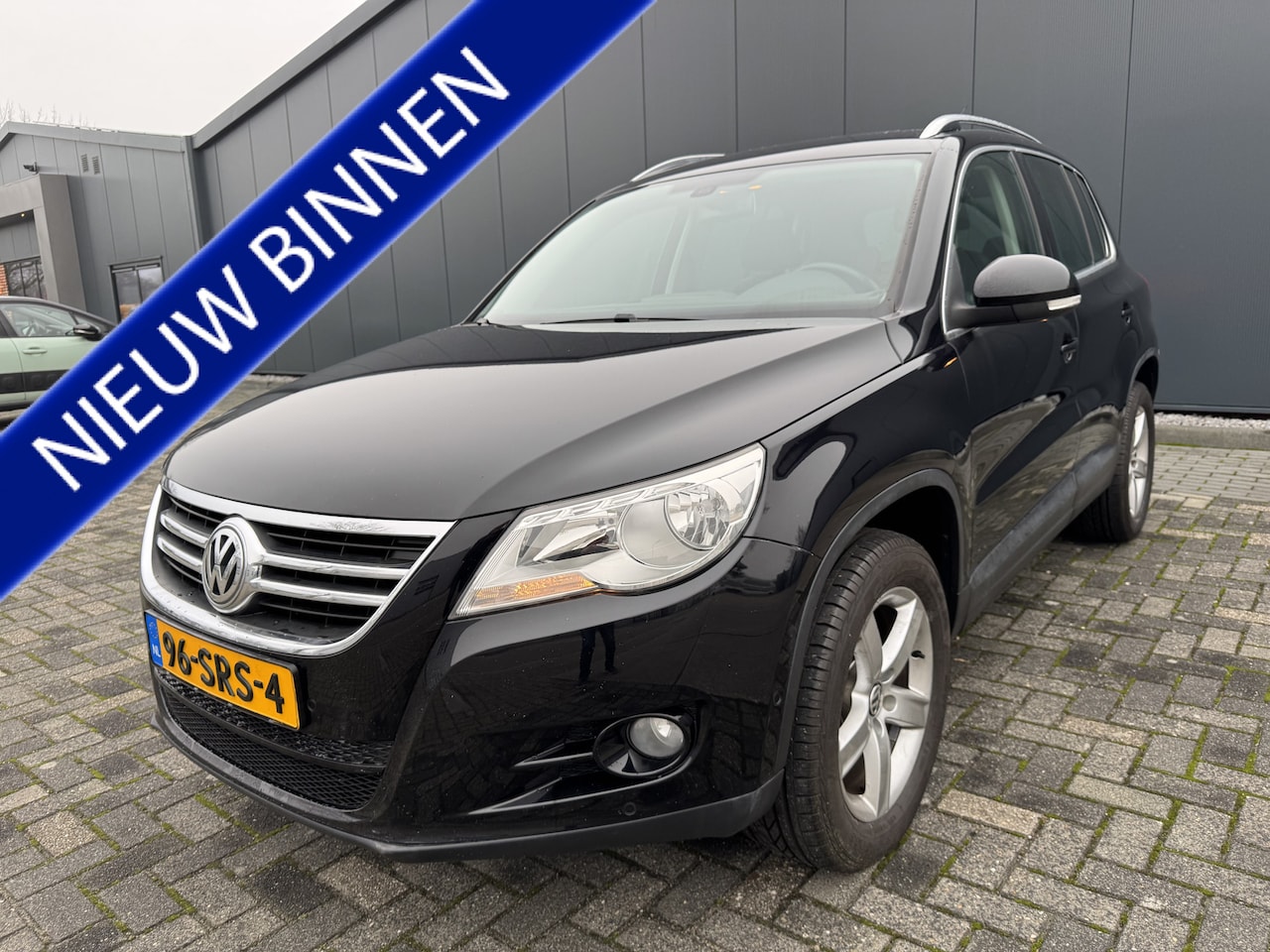 Volkswagen Tiguan - 2.0 TSI Sport&Style 4Motion AUT. LEER. VOL OPTIES. - AutoWereld.nl