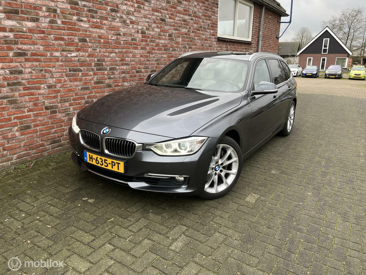 BMW 3-serie Touring - 335i xDrive High Executive 335i xDrive High Executive - AutoWereld.nl