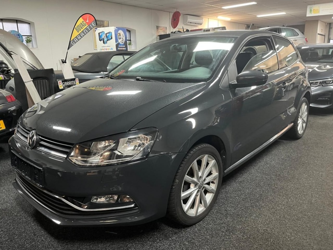 Volkswagen Polo - 1.2 TSI Highline 1.2 TSI HIGHLINE - AutoWereld.nl