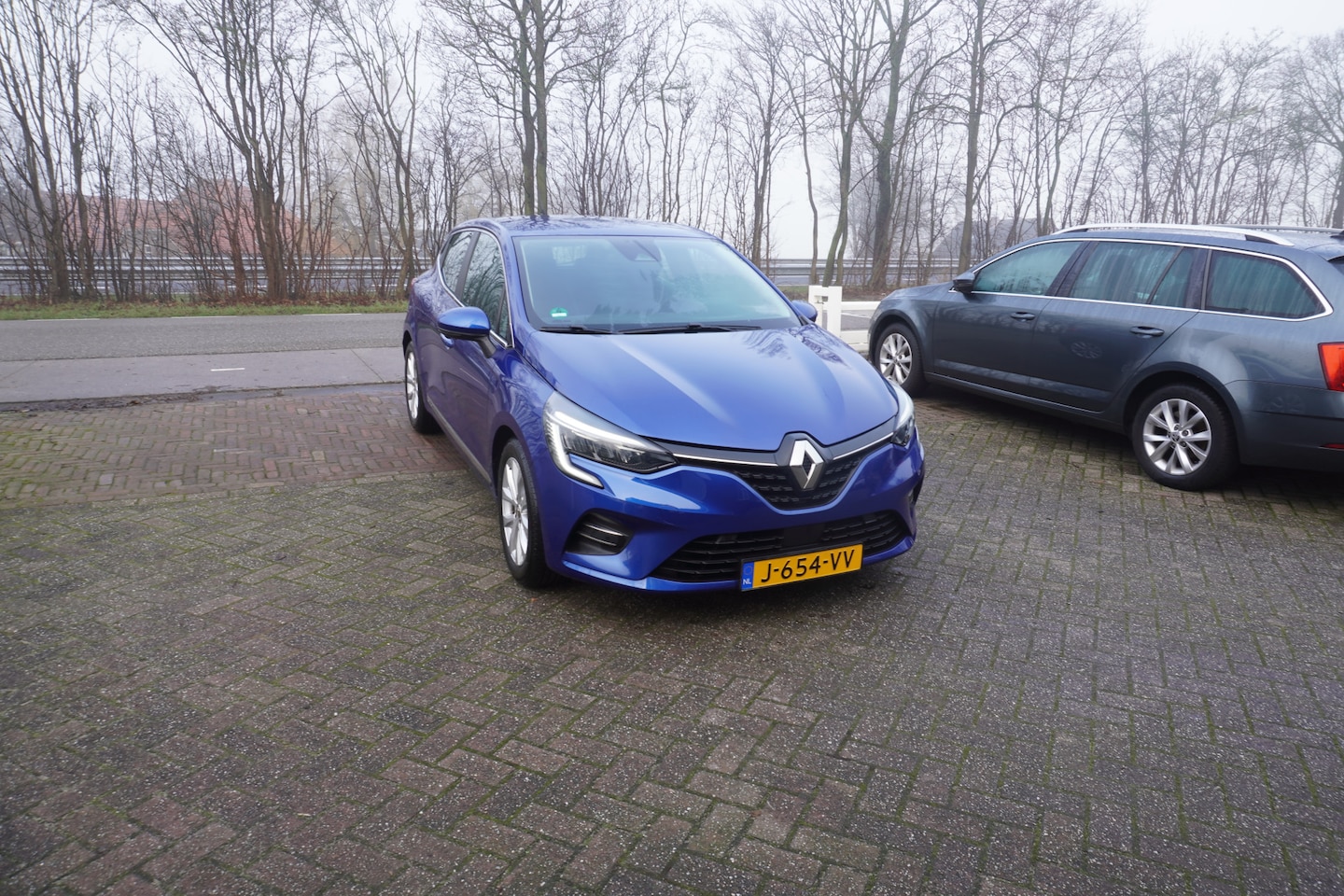 Renault Clio - 1.0 TCe Intens CRUISE CLIMA NAVI CARPLAY CAMERA - AutoWereld.nl