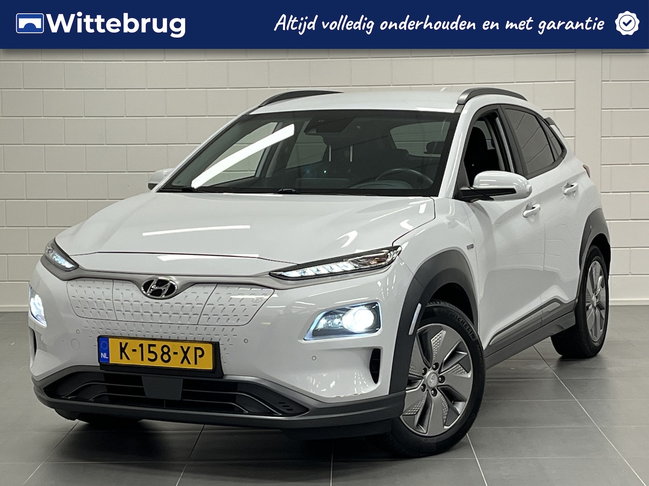 Hyundai Kona Electric - EV Premium 64 kWh 3 FASE | FULL LED | LEDER | KEYLESS | COMPLETE SUV | LONG RANGE - AutoWereld.nl