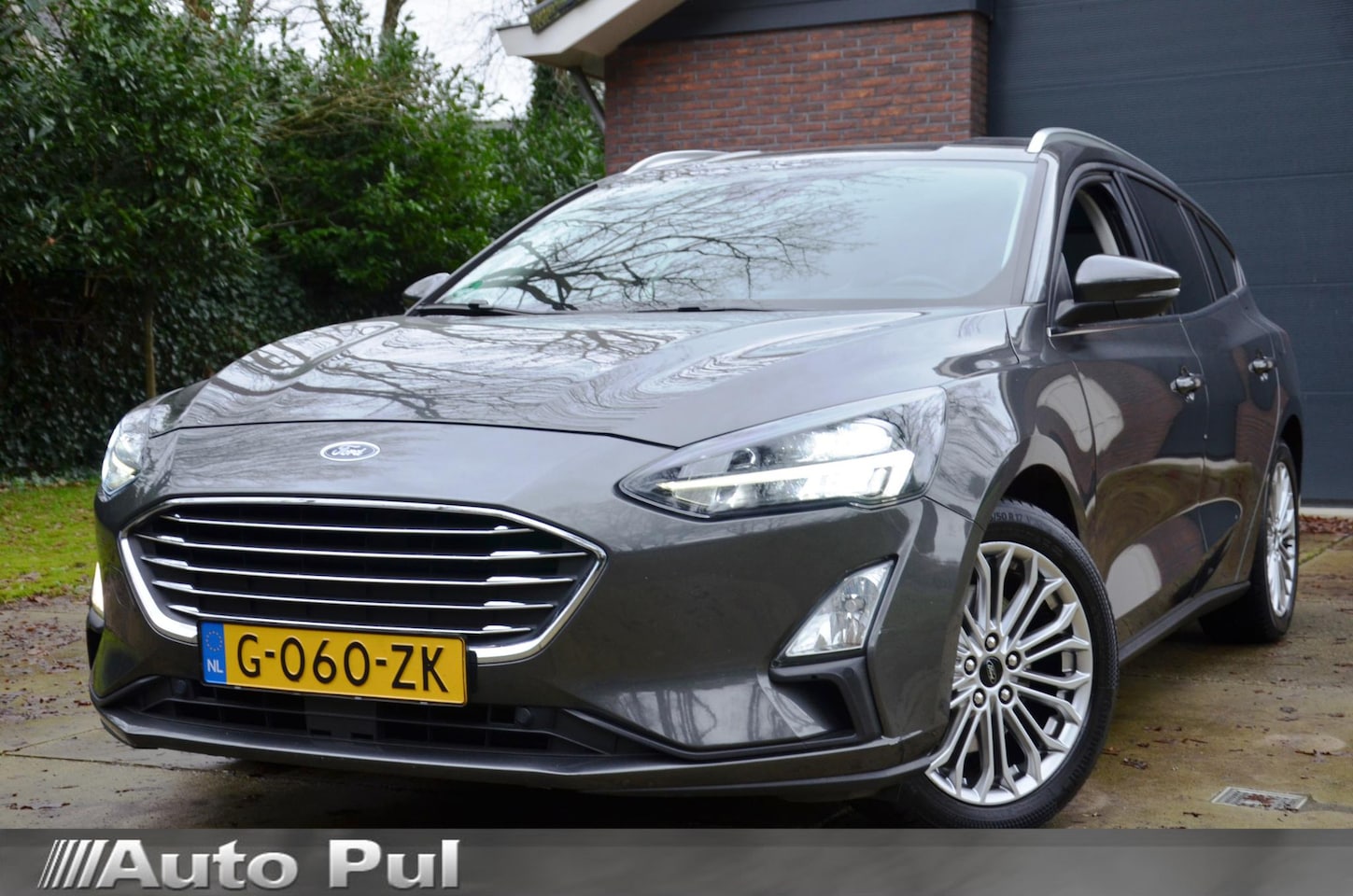 Ford Focus Wagon - 1.0 EcoBoost Titanium Business Navi/Pdc/Ecc/Led/Stoel Stuur & ruitverwarming/Achteruitrijc - AutoWereld.nl