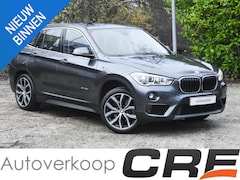 BMW X1 - sDrive20i / automaat / 2e eig. / HUD / pano-dak / zwart leer / trekhaak / 19" LM-velgen /