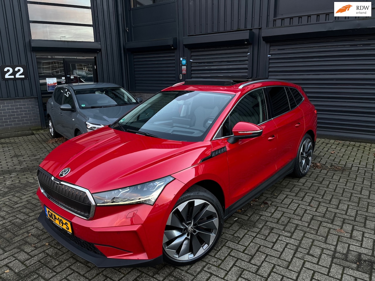 Skoda Enyaq iV - 80 *Candy Red Metalic bijzonder mooi*Nieuwstaat* - AutoWereld.nl