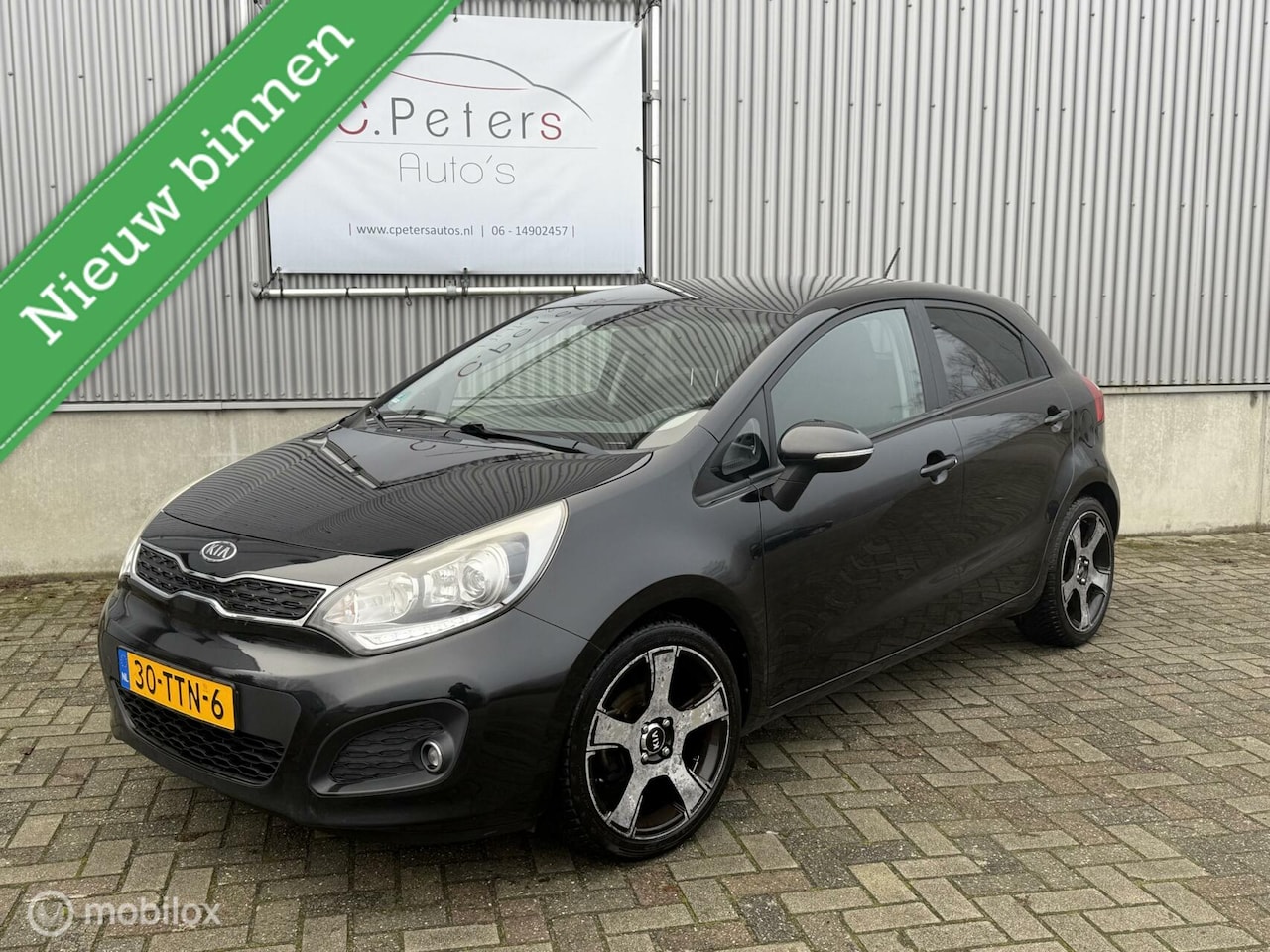 Kia Rio - 1.2 CVVT Super Pack 2012 / Climate control / Cruisecontrol / Keyless / Parkeersensor / NAP - AutoWereld.nl