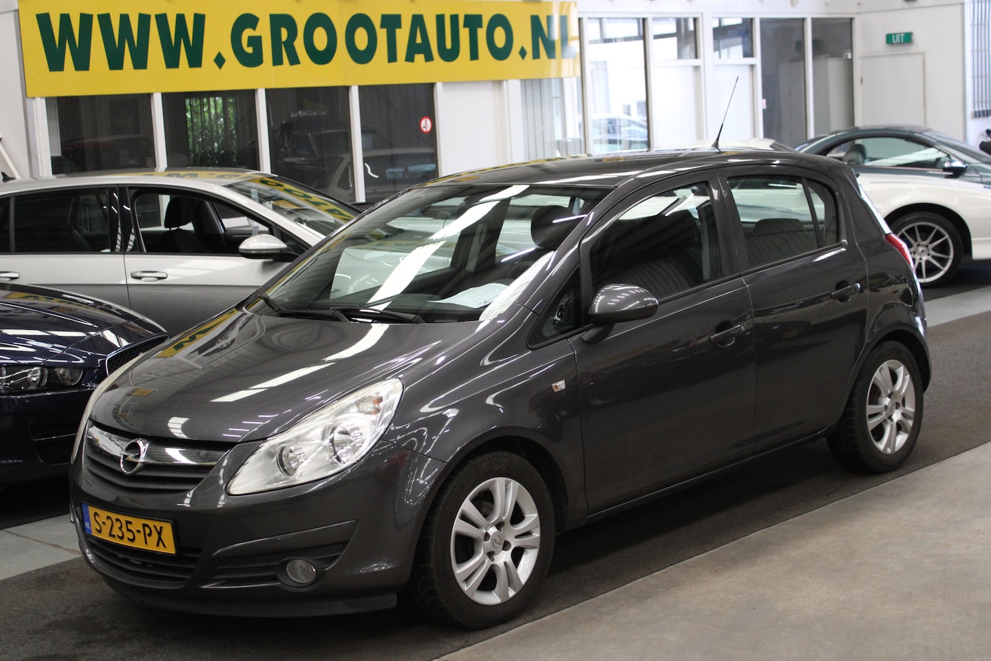 Opel Corsa - 1.2-16V Cosmo Airco, Cruise control, Isofix, Stuurbekrachtiging - AutoWereld.nl