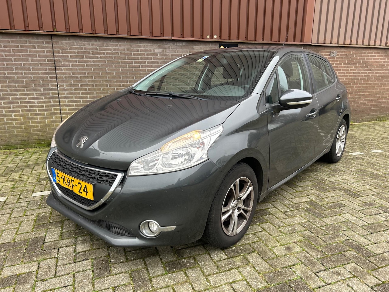 Peugeot 208 - 1.2 VTi Envy Navi Clima PDC APK NAP 5drs. Airco - AutoWereld.nl