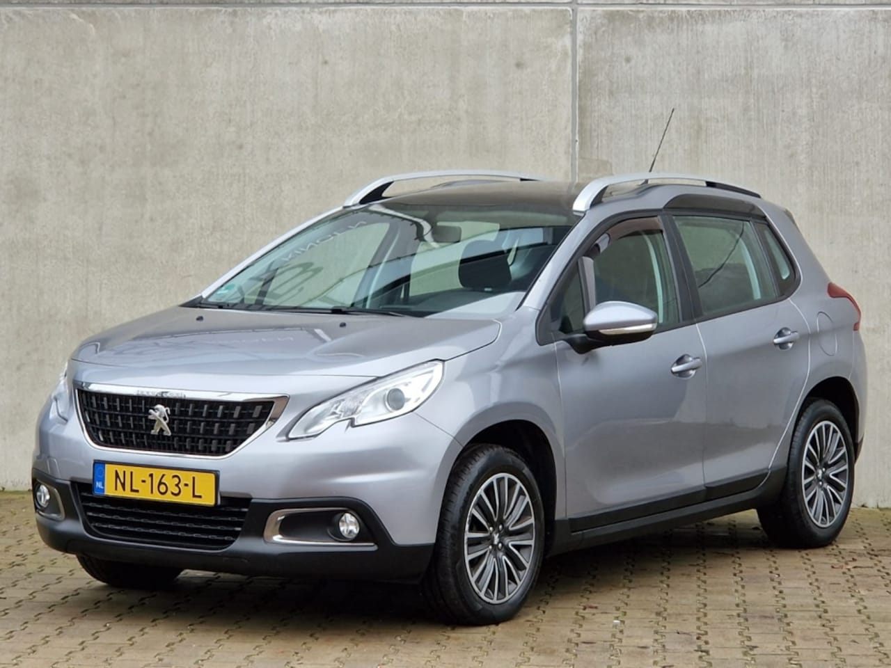 Peugeot 2008 - 1.2 PureT. Blue Lion navi nap nwe apk 2026 - AutoWereld.nl