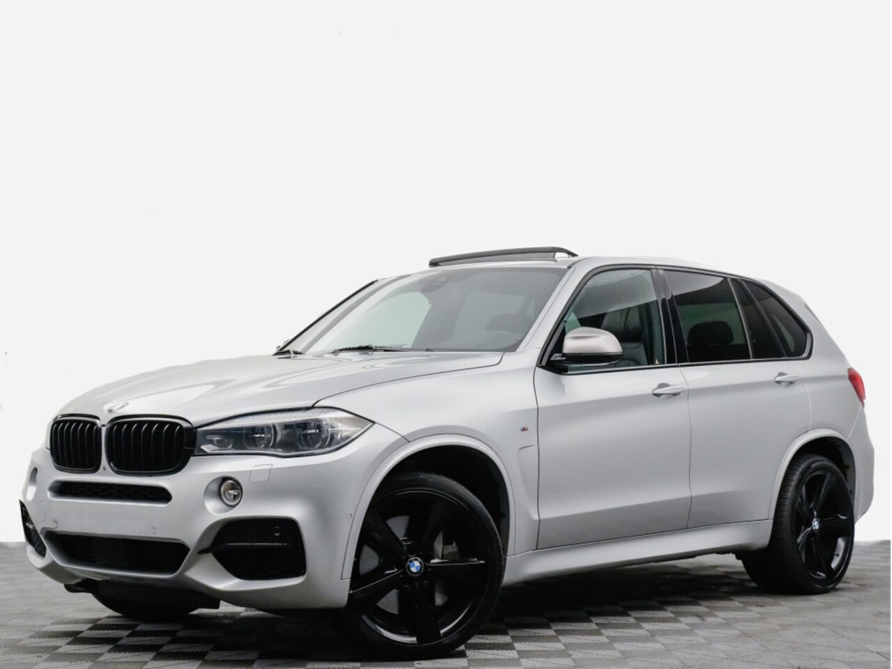 BMW X5 - M50d 380pk (B&O,head-up,panodak,360,memory,sfeerverlichting) - AutoWereld.nl