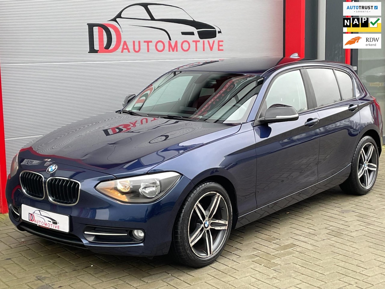 BMW 1-serie - 116i Business NAVI/PDC/WEINIGKM/6BAK/STOELVERW/NWAPK - AutoWereld.nl