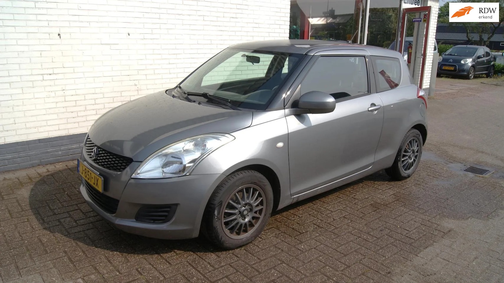 Suzuki Swift - 1.2 Comfort EASSS trekhaak/airco RIJKLAARPRIJS - AutoWereld.nl