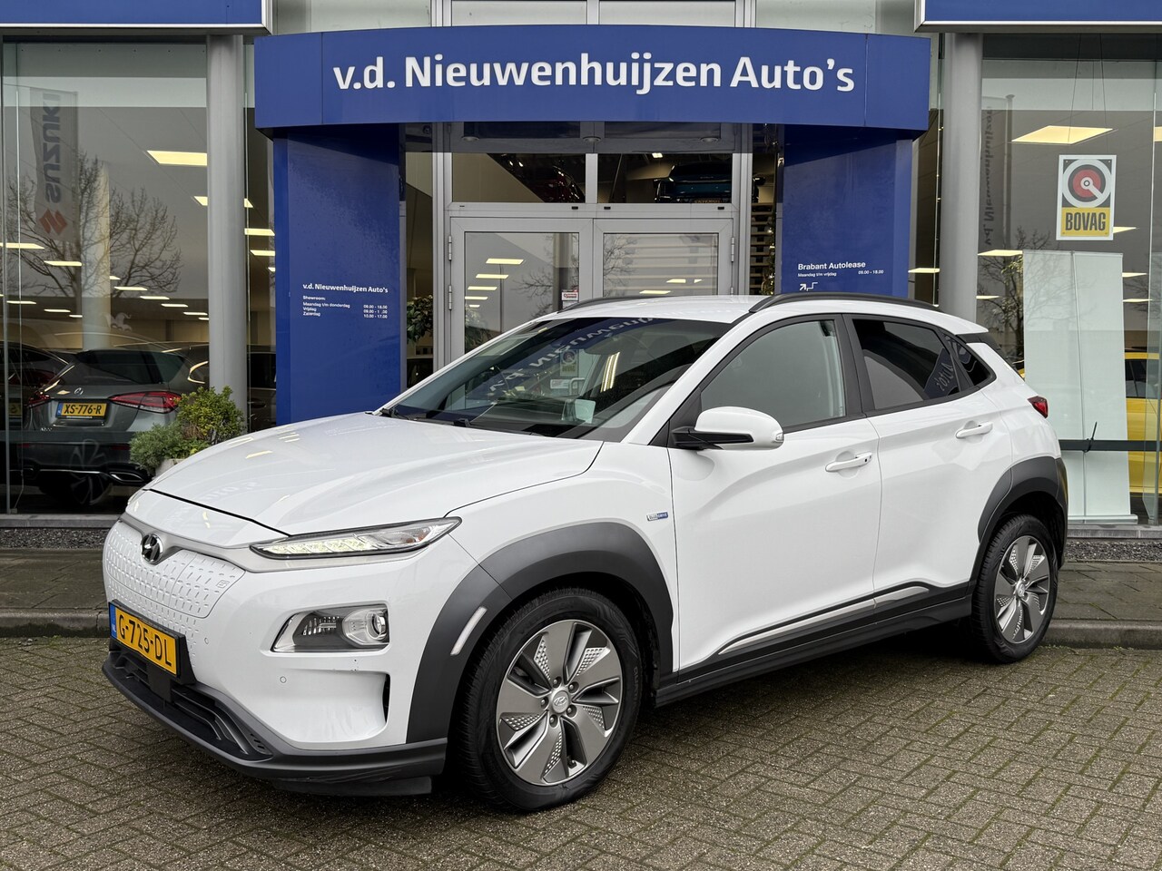 Hyundai Kona Electric - EV Premium 64 kWh | Leder | HUD | Navi | Info Bas 0492588980 - AutoWereld.nl