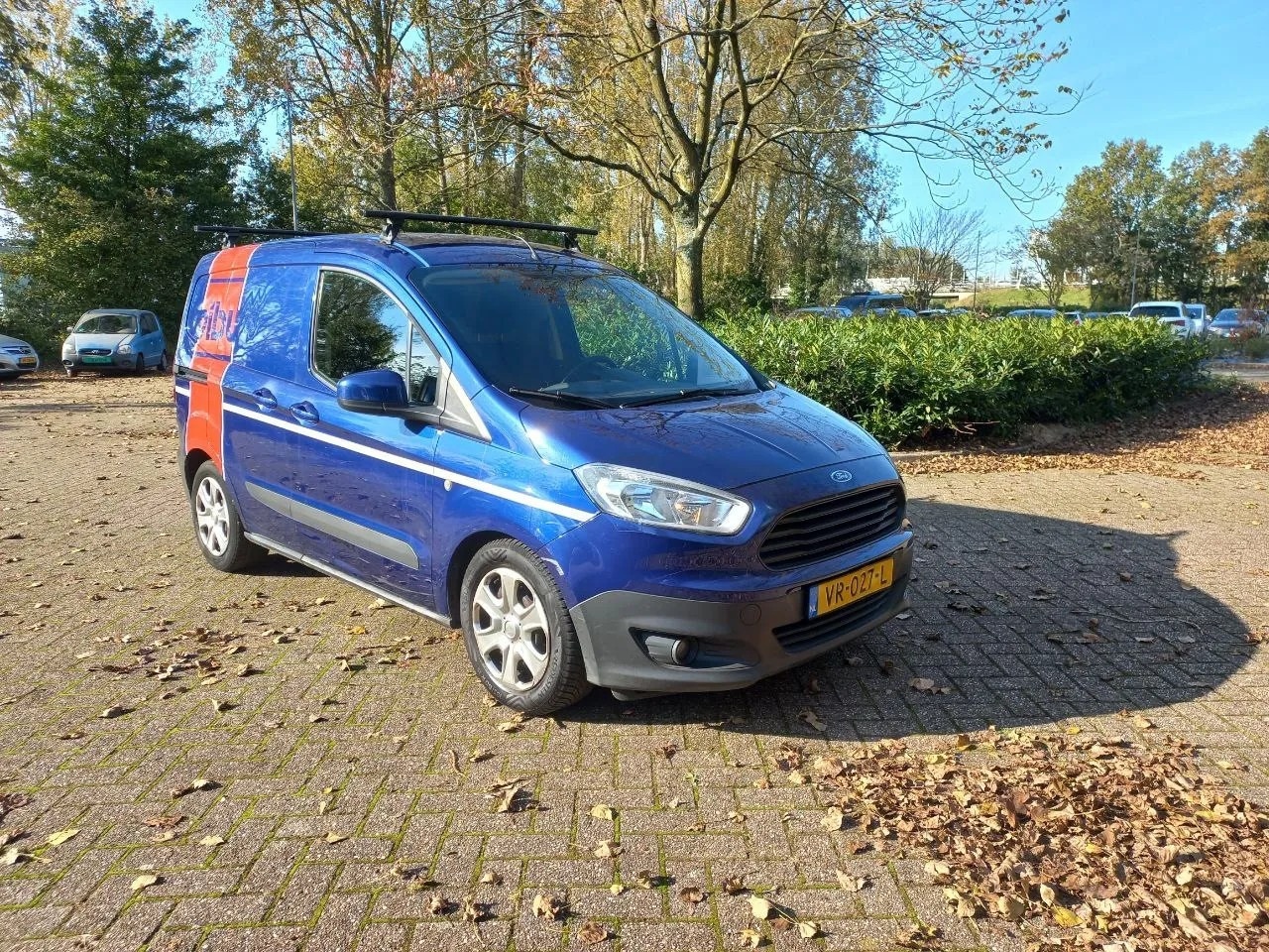 Ford Transit Courier - 1.5 TDCI NW APK Trend Airco Cruise Dakrail - AutoWereld.nl