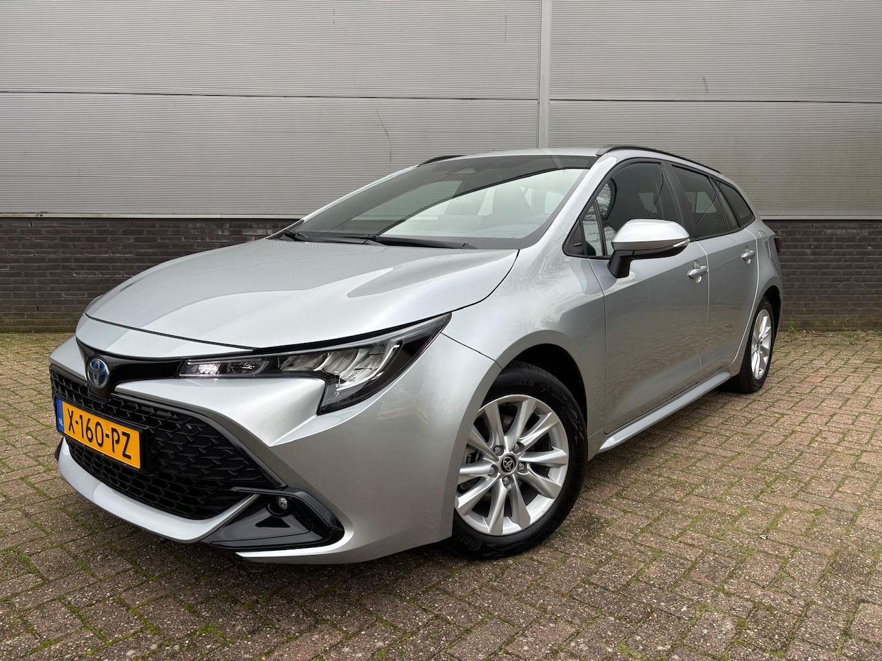 Toyota Corolla Touring Sports - Hybrid 140 Active - AutoWereld.nl