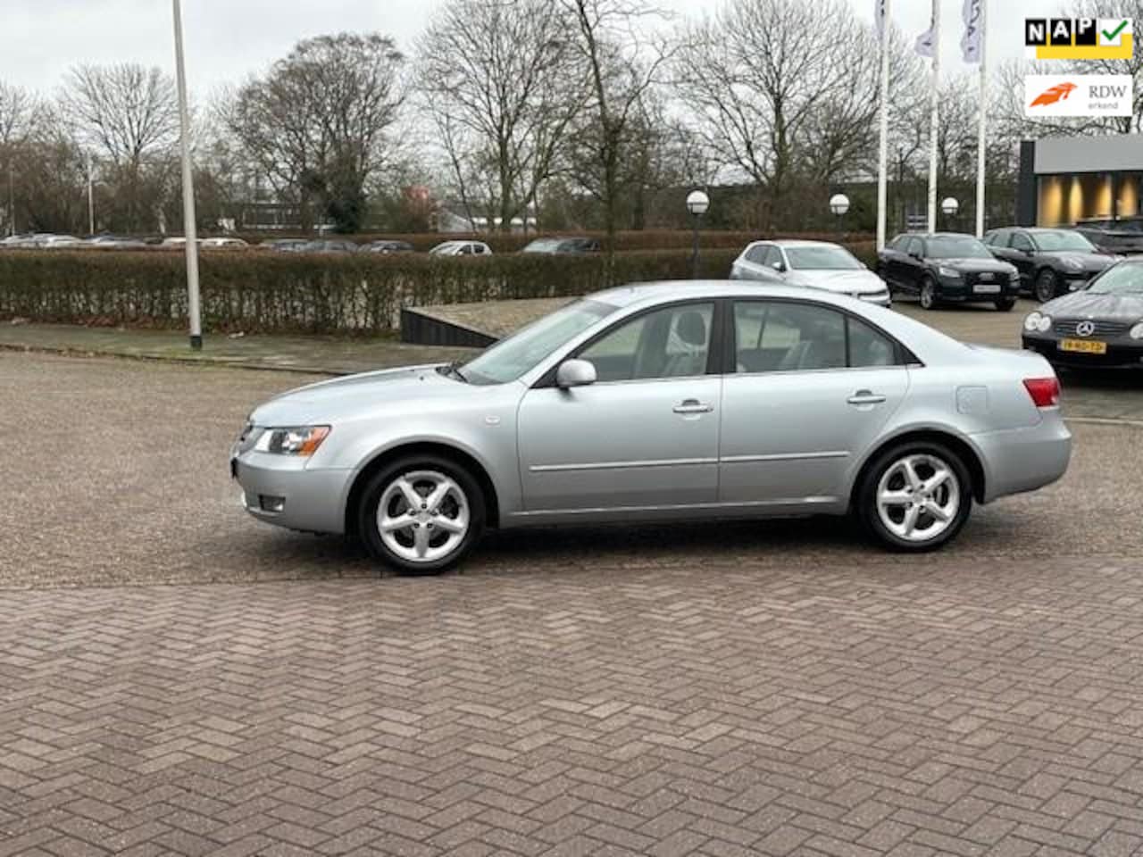 Hyundai Sonata - 2.4 Style sedan,bj.2006,climate,sportvelgen,pdc,cruise control,APK tot 11/2025 en NAP met - AutoWereld.nl