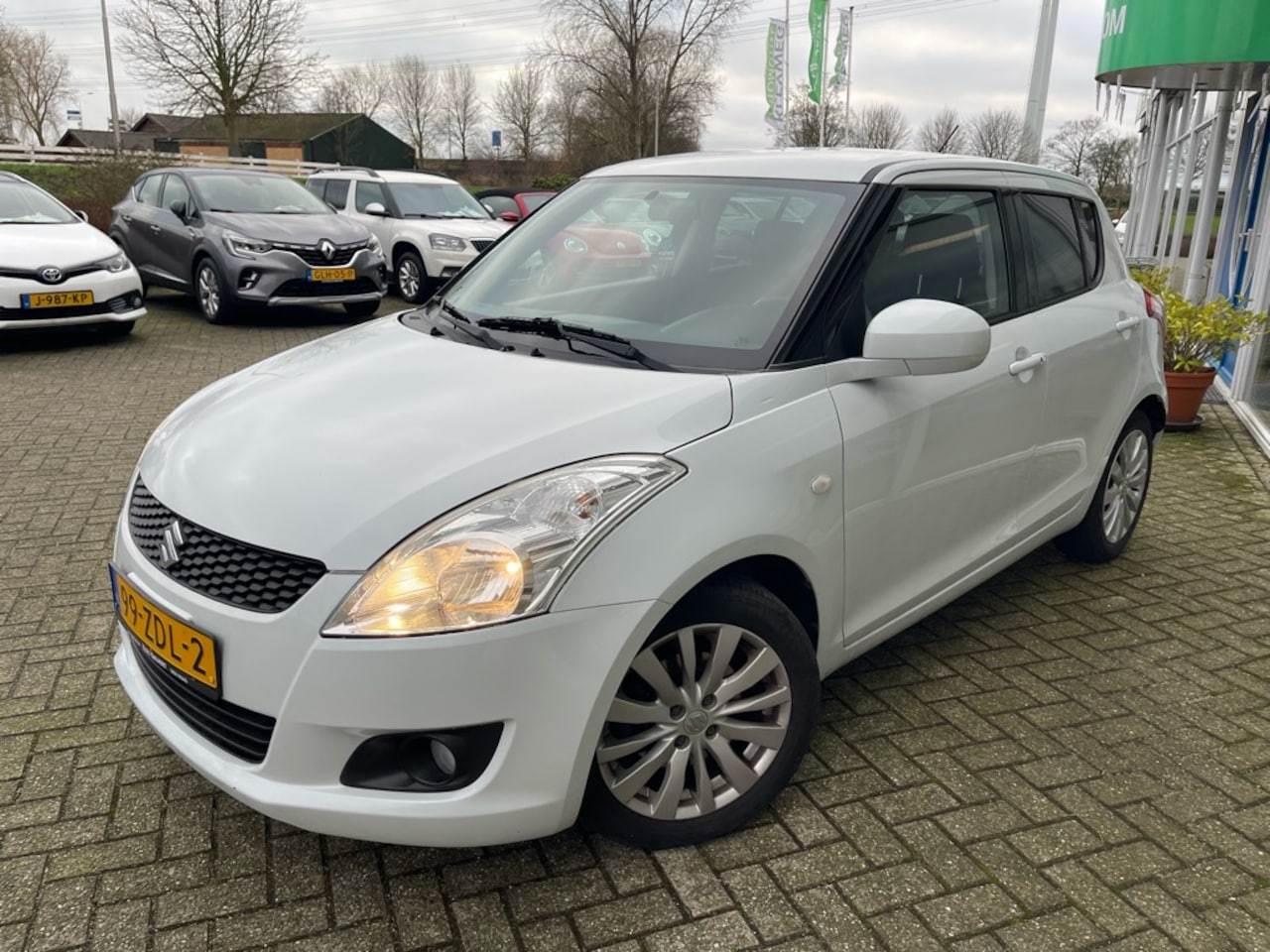 Suzuki Swift - 1.2 Exclusive 1.2 Exclusive, Automaat, 1e eigenaar, Lage km stand - AutoWereld.nl