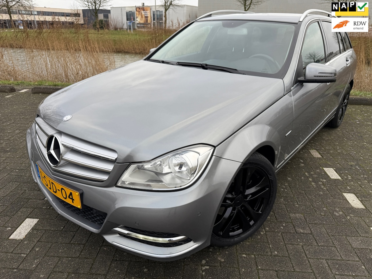 Mercedes-Benz C-klasse Estate - 180*NAVI*PARKEREN SENSOREN*ELKT-STOEL*APK*NAP*AIRCO*STOEL VERWARMING - AutoWereld.nl