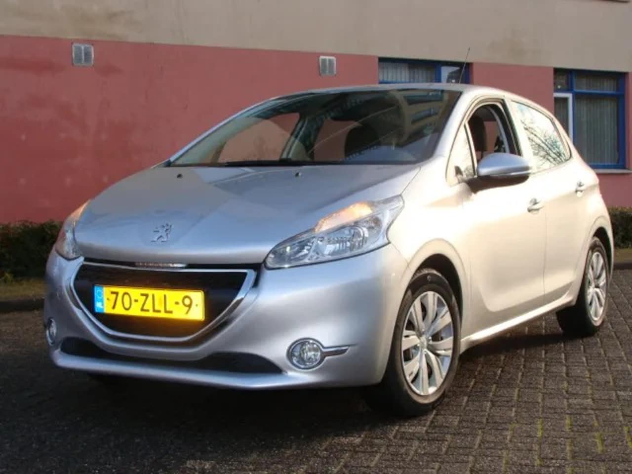 Peugeot 208 - 1.2 VTi Envy VOLLEDIG DEALER ONDERHOUDEN - AutoWereld.nl