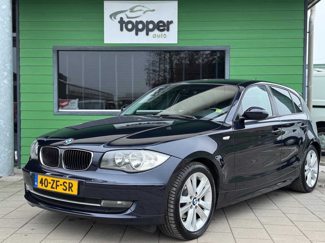 BMW 1-serie - 120i High Executive / Automaat / Navigatie / - AutoWereld.nl