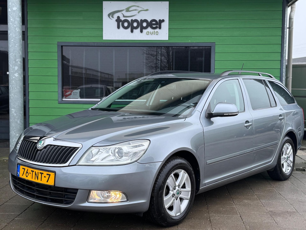 Skoda Octavia Combi - 1.2 TSI Ambition Business Line / Automaat / Navi / - AutoWereld.nl