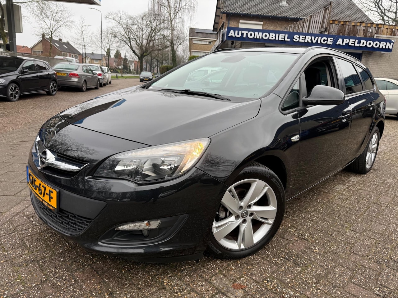 Opel Astra Sports Tourer - Astra 1.4 Turbo AUTOMAAT *140PK!*AIRCO*STOELVERW.*STUURVERW.*PDC*CRUISE*DIML. AUTOM.* - AutoWereld.nl