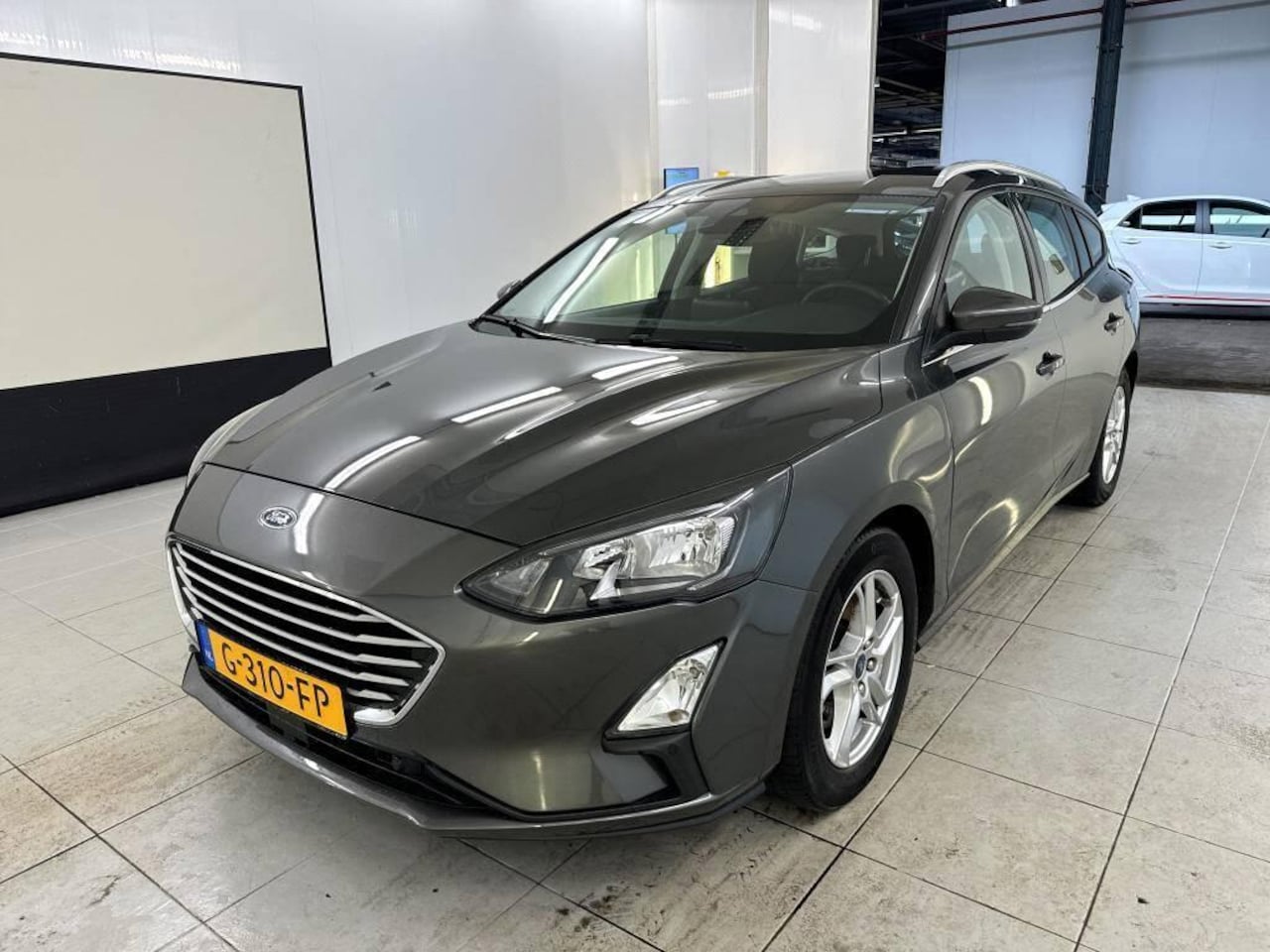 Ford Focus Wagon - 125pk EcoBoost Titanium Business Navi Winter pack Keyless Wagon Dealeronderhouden - AutoWereld.nl