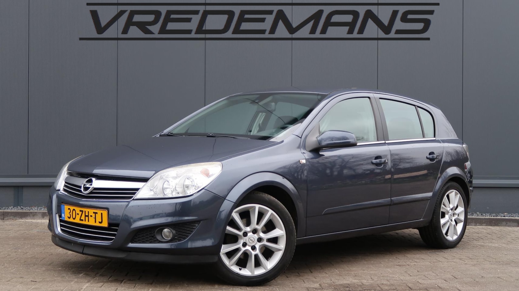 Opel Astra - 1.6 Cosmo NAVI/STOELVERW. - AutoWereld.nl