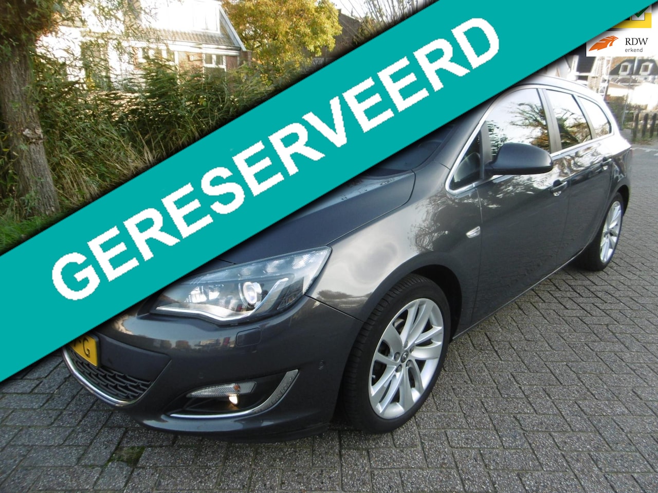 Opel Astra Sports Tourer - 1.4 Turbo Sport + 140pk 2e eig. Xenon Navi Trekhaak - AutoWereld.nl