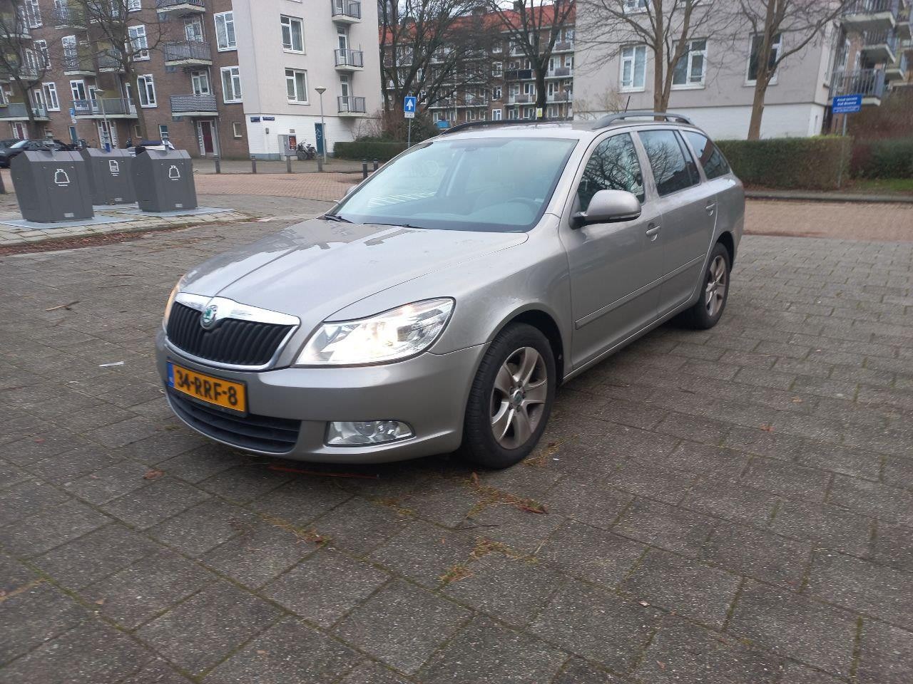 Skoda Octavia Combi - 1.2 TSI Ambition Business Line Airco Cruise Navi - AutoWereld.nl