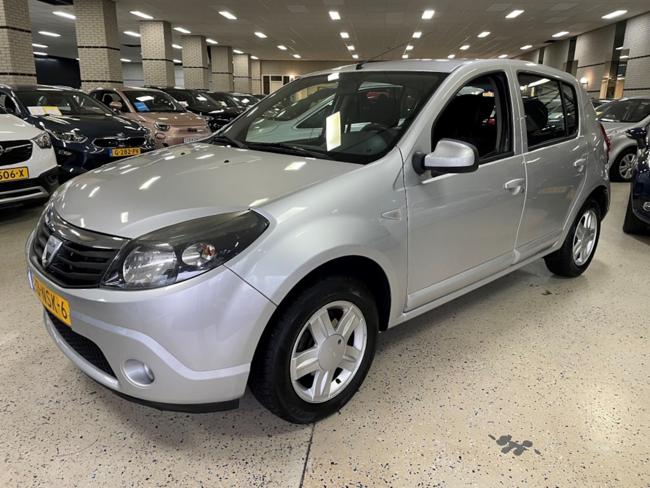 Dacia Sandero - 1.2 AMBIANCE / AIRCO / ISOFIX / AUX / TREKHAAK - AutoWereld.nl